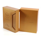 Gold TEEB Oud Al Amiri gift box with embossed logo, shown with its sliding sleeve