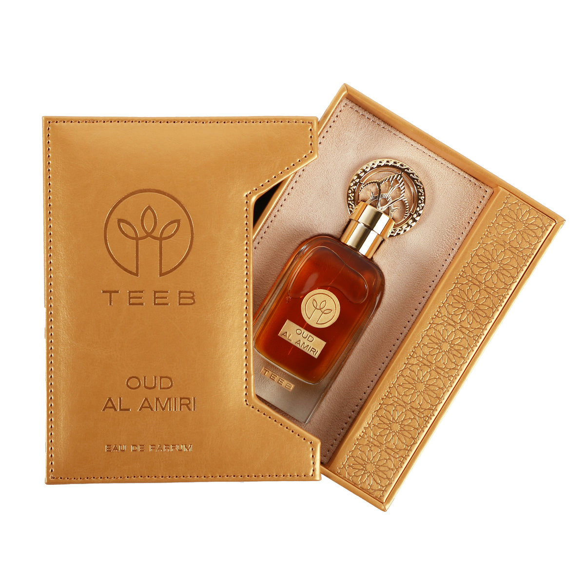 Open gold TEEB Oud Al Amiri gift box showing the bottle inside beside its embossed sleeve