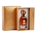 Gold TEEB Oud Al Amiri box open with the bottle in a cream-lined tray next to its embossed cover