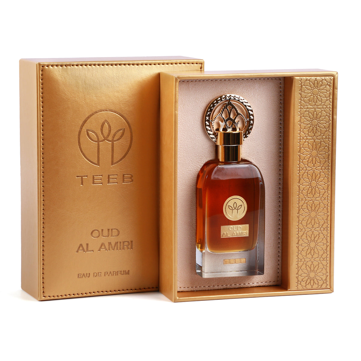 Gold TEEB Oud Al Amiri box open with the bottle in a cream-lined tray next to its embossed cover