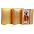 Three gold TEEB Oud Al Amiri gift boxes, one open showing the bottle inside