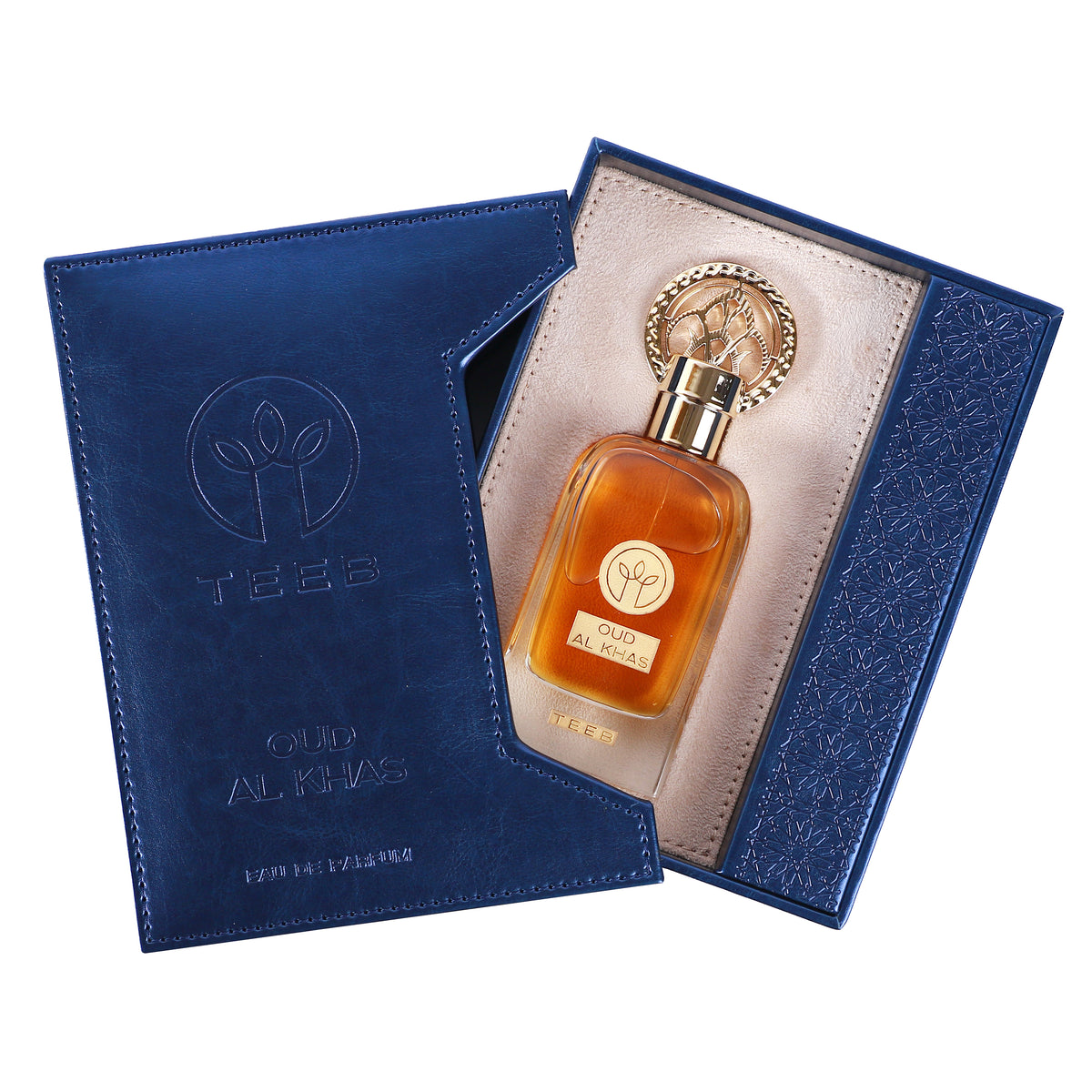 Open navy blue TEEB Oud Al Khas box with the bottle in a cream-lined tray