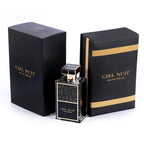 Ciel Nuit Eau de Parfum bottle in front of two black and gold boxes