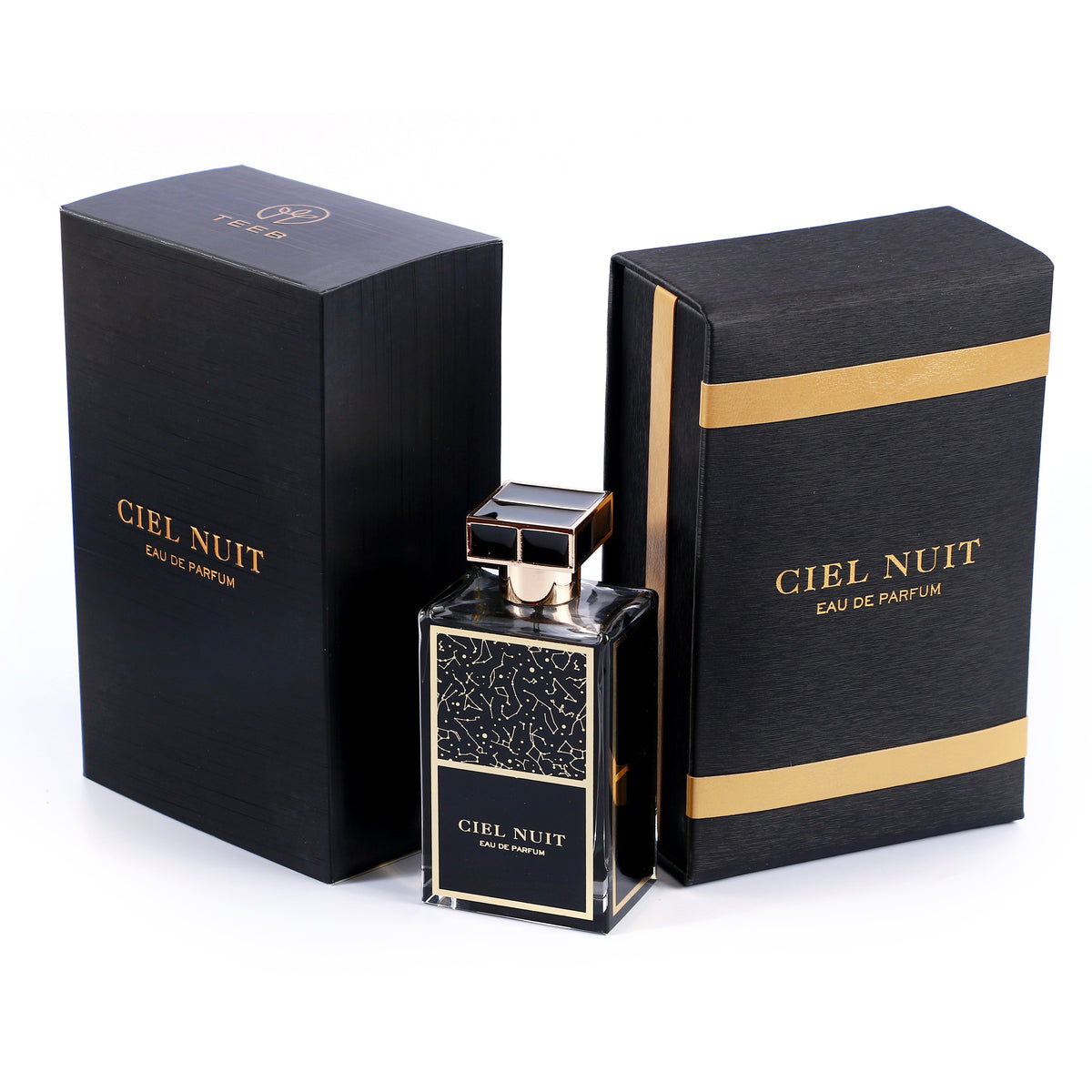 Ciel Nuit Eau de Parfum bottle in front of two black and gold boxes