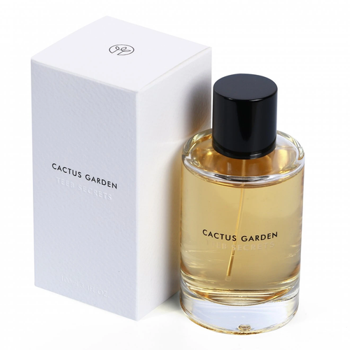 Cactus Garden Teeb Secrets bottle with pale gold liquid beside its white box