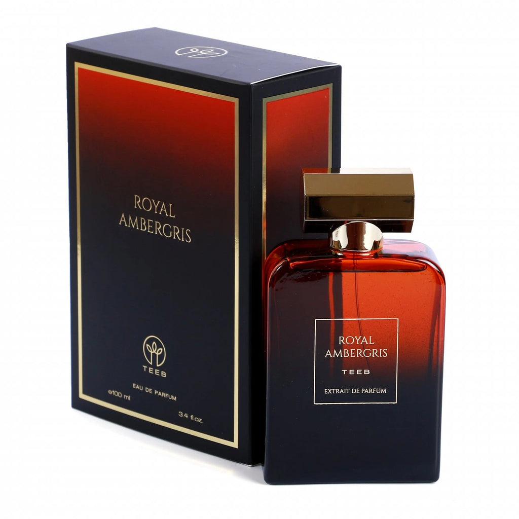 Royal Ambergris bottle beside its navy and red box with gold border