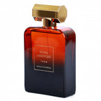 Royal Ambergris bottle in red fading to navy with a gold faceted cap
