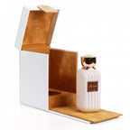 Open white Lunosa gift box with tan lining and the bottle standing beside it