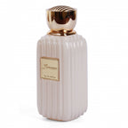 Lunosa Eau de Parfum cream ribbed bottle with a gold cap and label